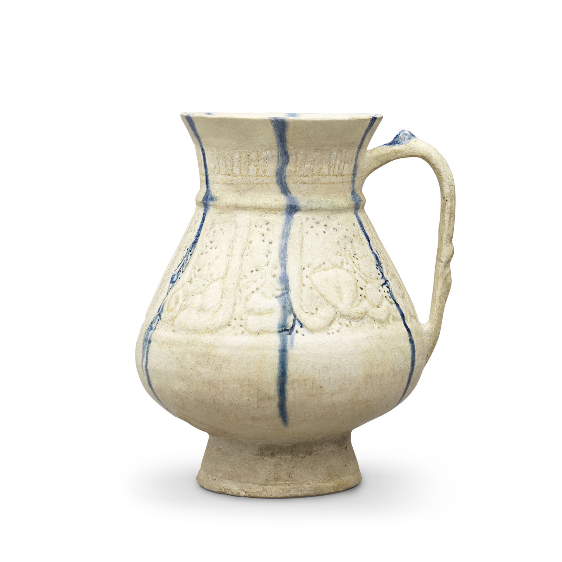 A Kashan pierced and incised blue and white pottery jug Persia, 12th/ 13th Century