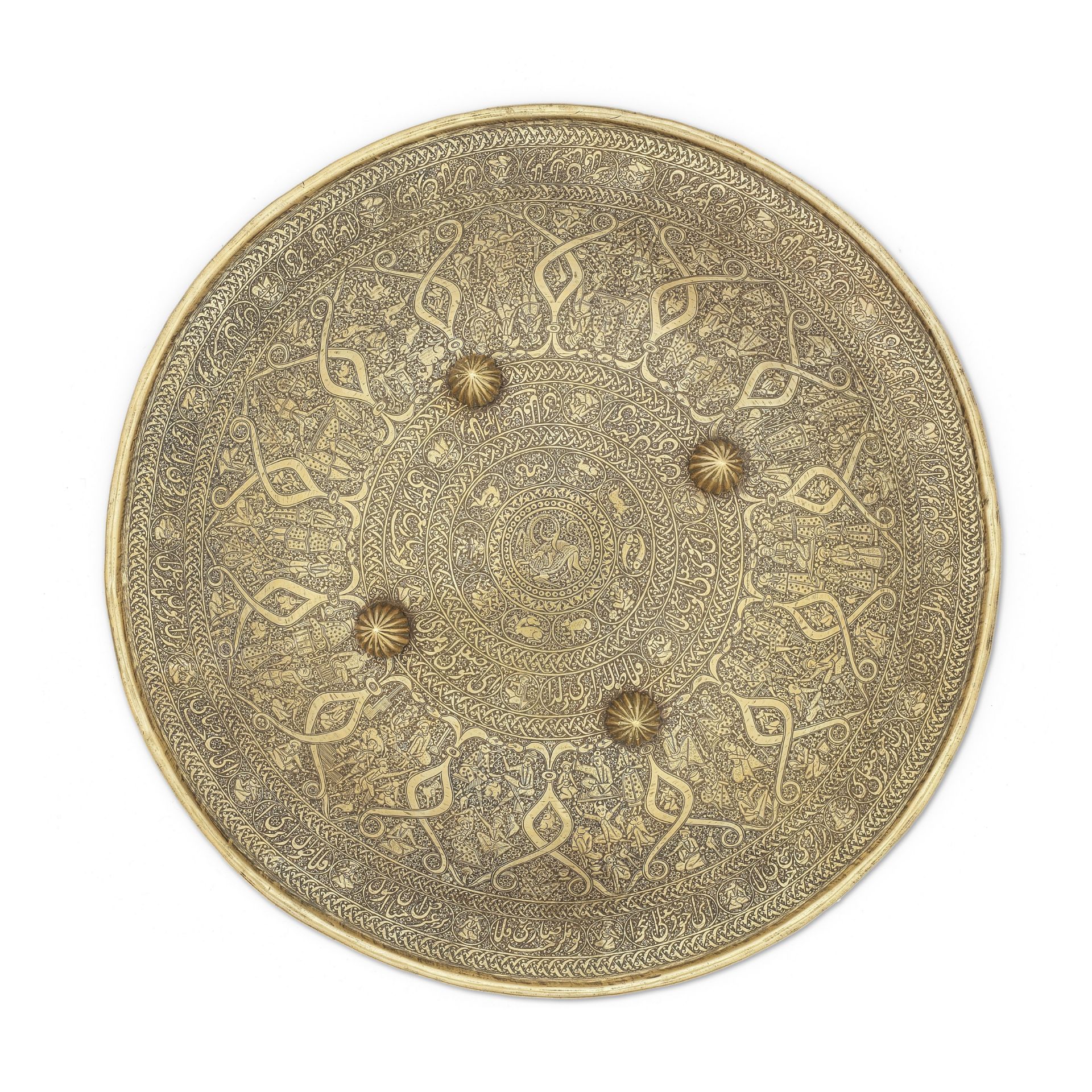 A Qajar engraved brass shield (dhal) Persia, early 20th Century