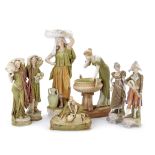 A collection of late 19th/early 20th century Royal Dux porcelain figures and figural pieces toget...