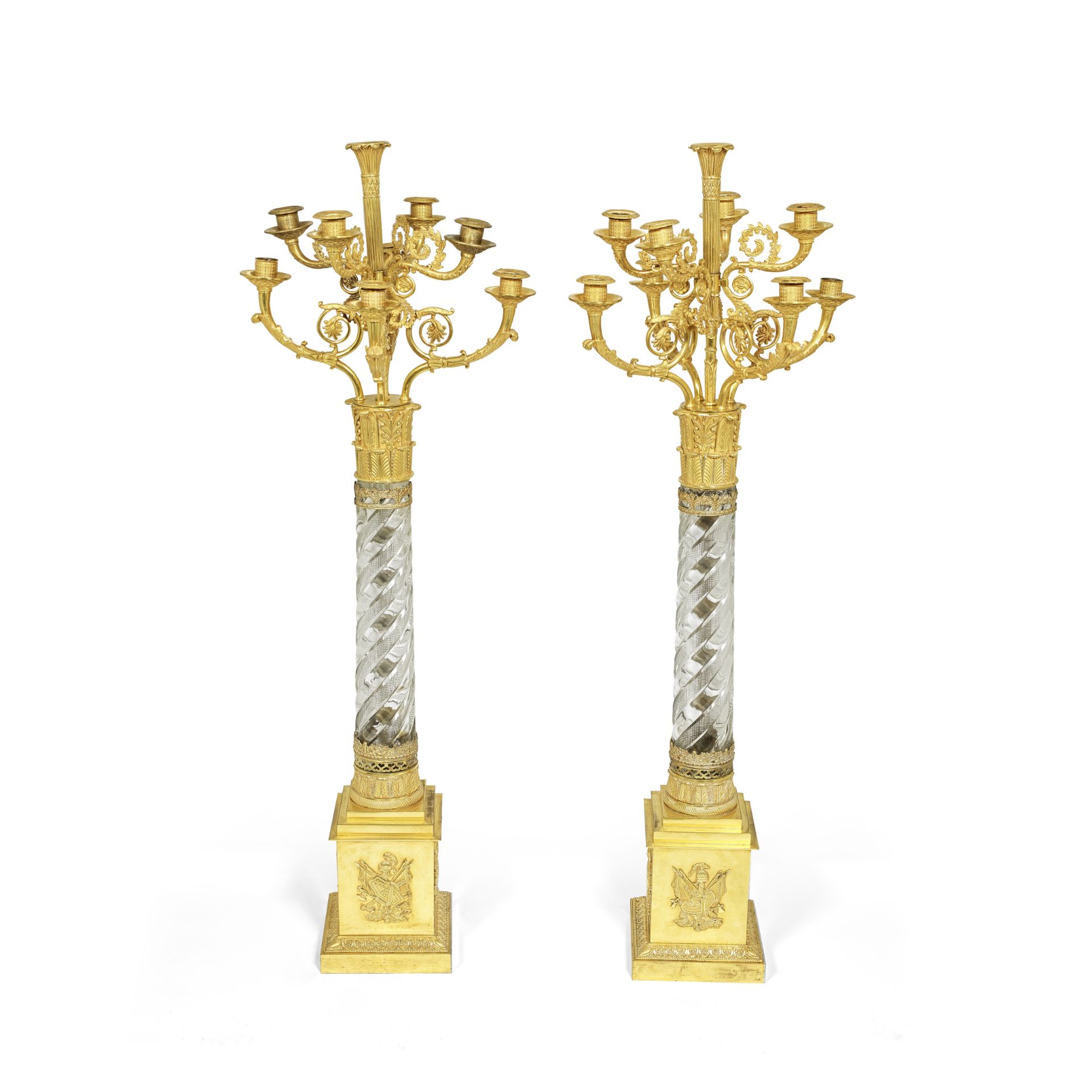 A pair of early 19th century French gilt bronze and cut glass nine light candelabra signed Thomir...