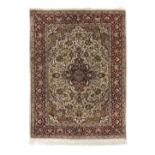 A Tabriz silk carpet North West Persia 150cm x 110cm