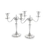 A matching pair of silver two-light candelabra Walker & Hall, Sheffield 1921 and 1933 (2)