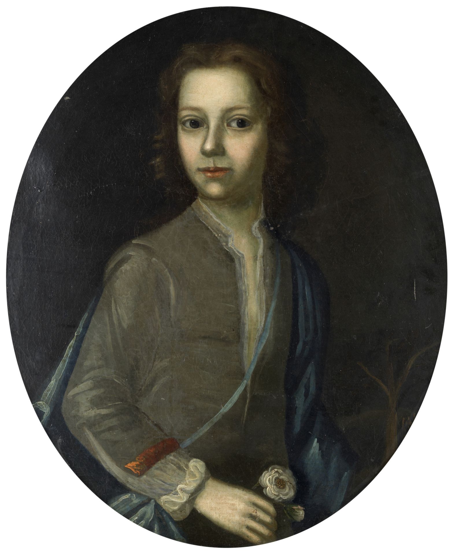 Follower of Jacob Huysmans (Antwerp 1633-1696 London) Portrait of a boy, half-length, holding a r...