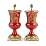 A pair of decorative mid 20th century gilt brass mounted orange porcelain urn lamp bases (2)