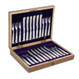 A cased set of Victorian silver and mother of pearl handled cake knives and forks Levesley Brothe...