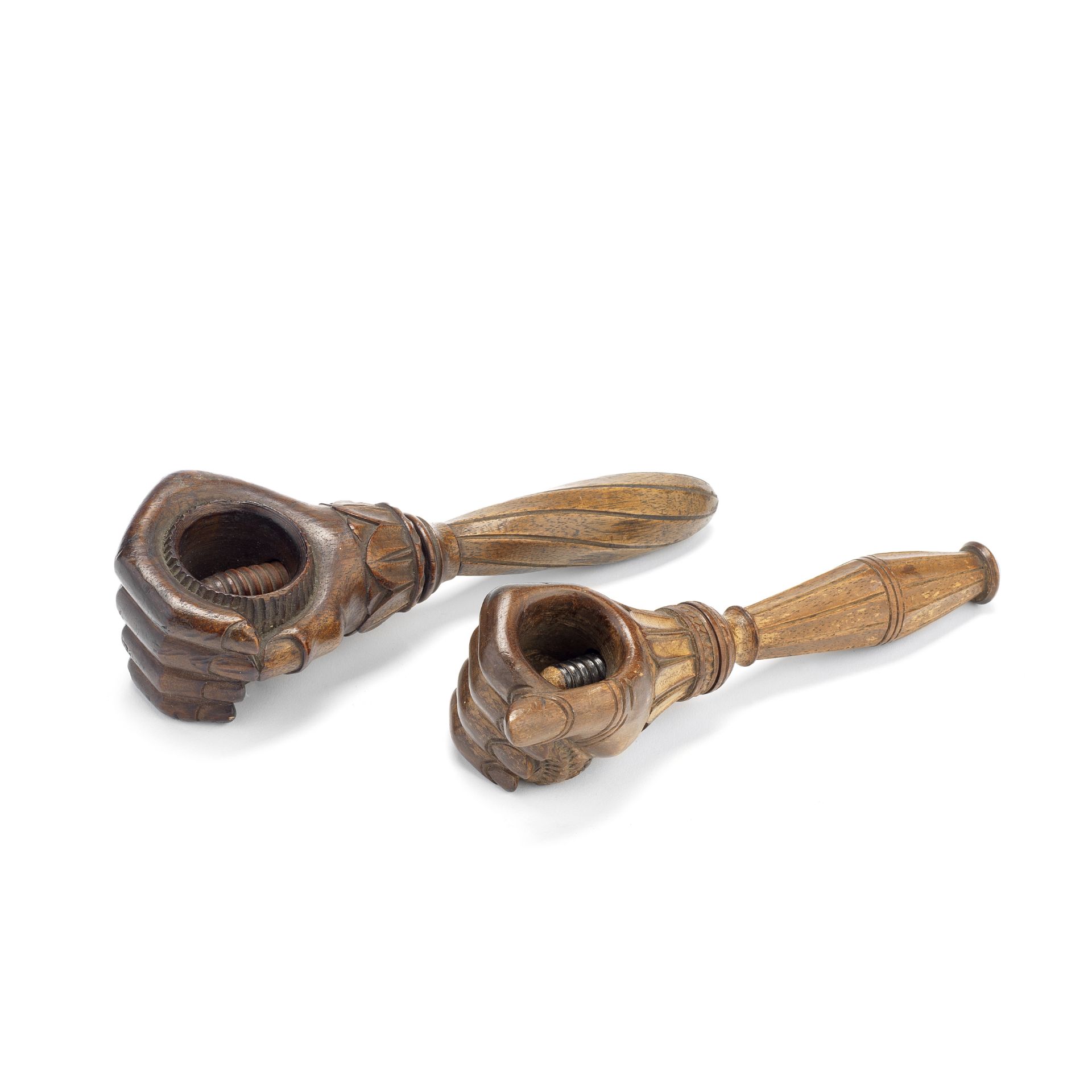 Two similar rare 19th century carved treen 'hand' nut crackers (2)