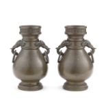 A PAIR OF BRONZE 'ELEPHANT-HANDLED' VASES Xuande six-character marks, Qing Dynasty (2)