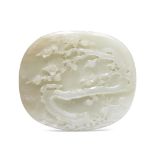 A PALE GREEN JADE 'PRUNUS' PLAQUE 19th century