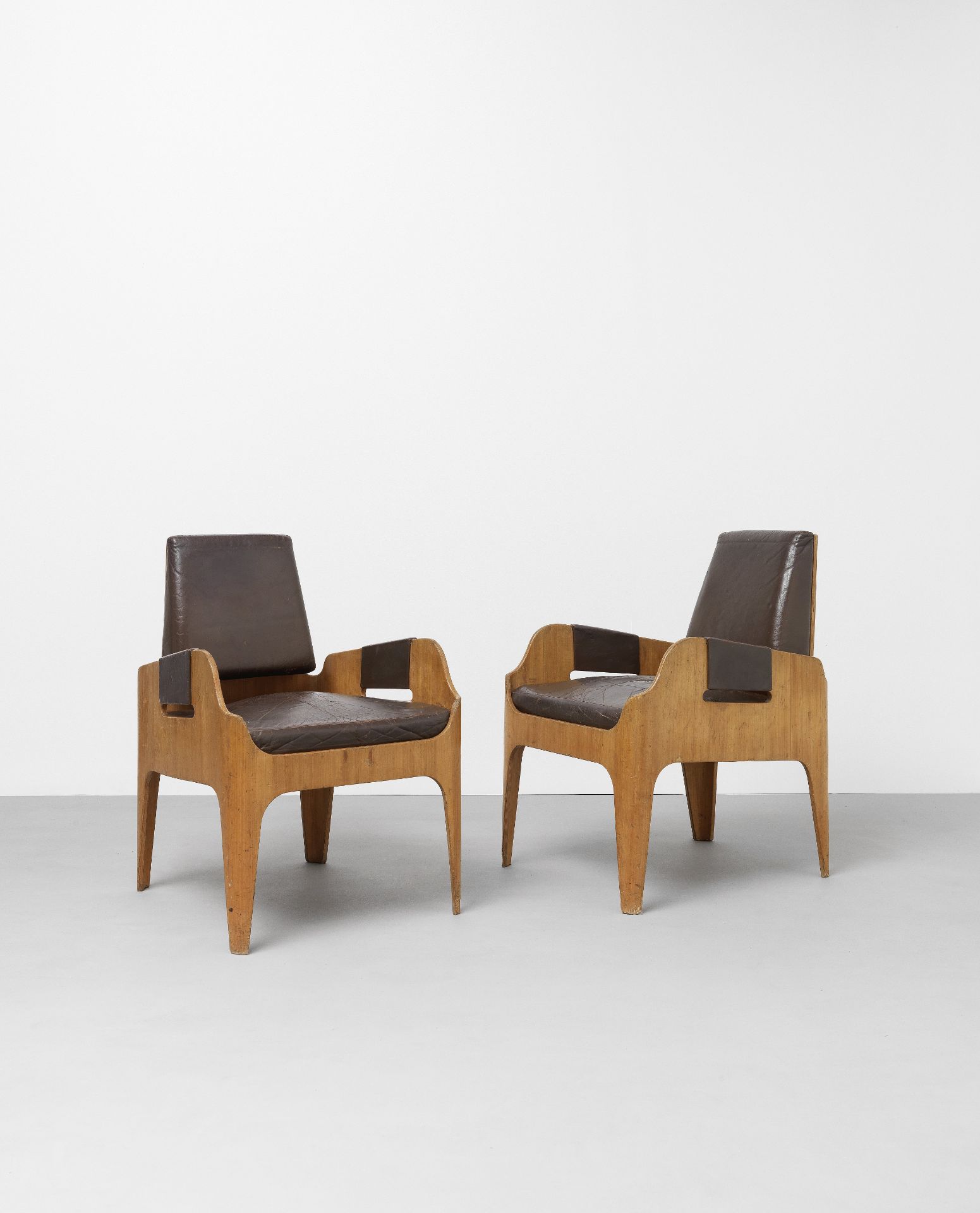 John Wright Pair of armchairs, from the 'SS Canberra' ocean liner, 1960s