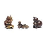 THREE WOOD AND LACQUERED-WOOD FIGURE NETSUKE One by Seiko, another by Chikusai, Edo period (1615-...