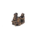 A WOOD NETSUKE OF ENMA-O AND AN ONI (DEMON) By Rakumin, Edo period (1615-1868), 19th century