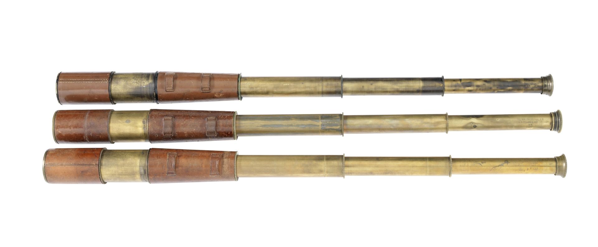 Three three-draw brass spotting-scopes