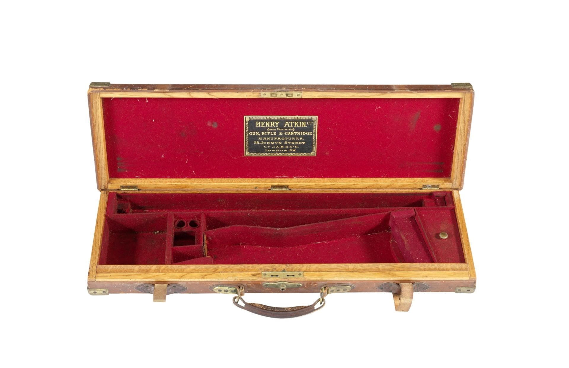 A brass-mounted oak and leather guncase by Henry Atkin with trade-label