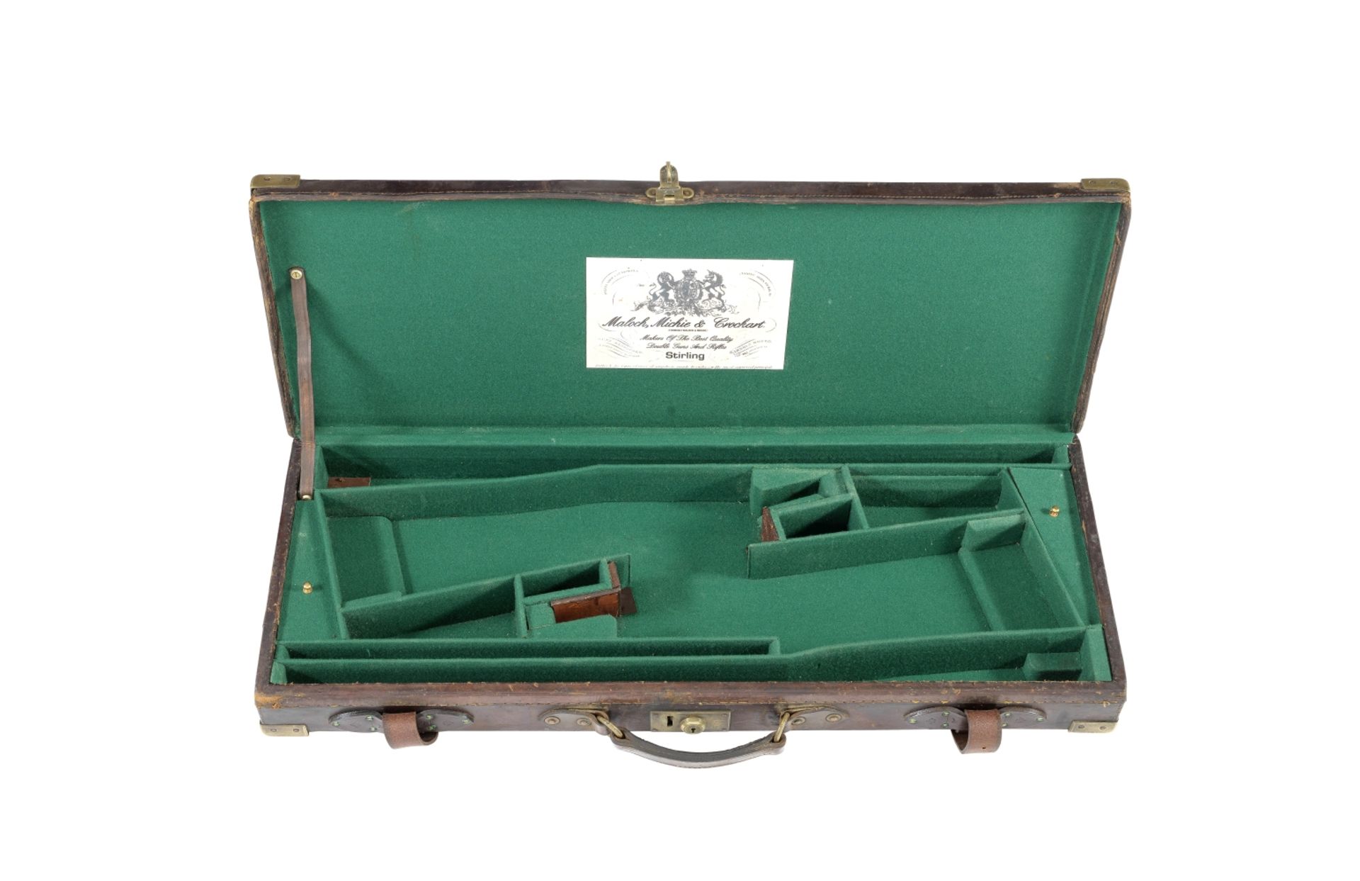 A brass-mounted leather double guncase