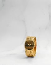 Piaget. Montre bracelet en or jaune 18K (750) avec cadran '&#339;il de tigre' mouvement m&#233;ca...