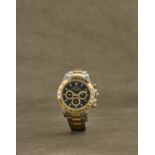 Rolex. Chronographe bracelet en or jaune 18K (750) et acier mouvement automatique Rolex. A stainl...