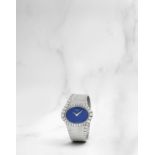 Piaget. Belle montre bracelet en or blanc 18K (750) sertie de diamants et cadran en lapis lazuli ...