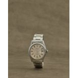 Rolex. Montre bracelet en acier avec date mouvement automatique Rolex. A stainless steel automati...