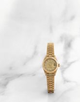 Rolex. Montre bracelet de dame en or jaune 18K (750) avec date et cadran serti de diamants mouvem...