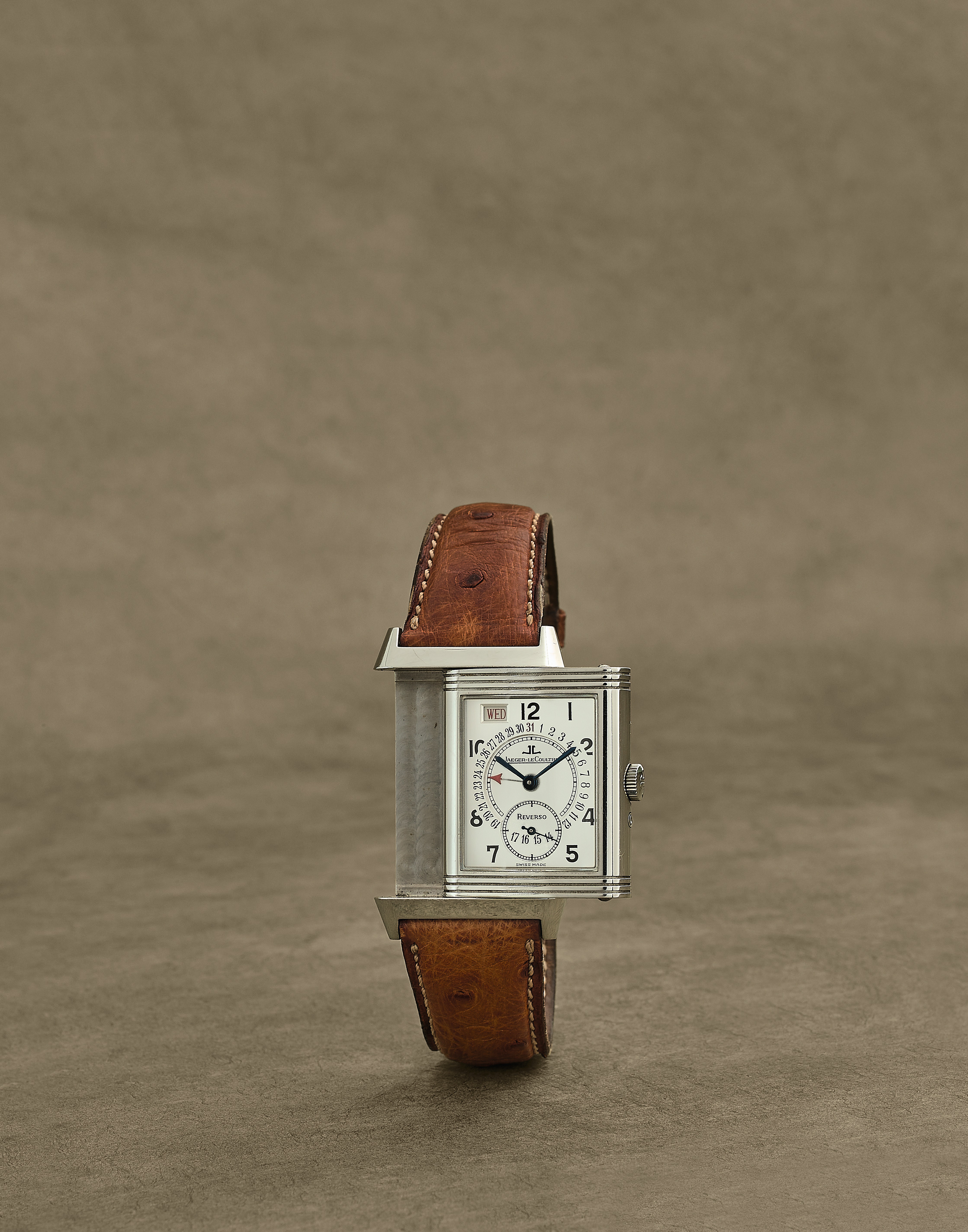 Jaeger-LeCoultre. Montre bracelet en acier rectangulaire r&#233;versible avec jour et date mouvem...