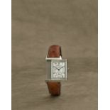 Jaeger-LeCoultre. Montre bracelet en acier rectangulaire r&#233;versible avec jour et date mouvem...