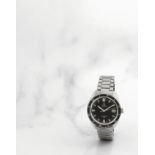 Omega. Montre bracelet en acier avec date mouvement automatique Omega. A stainless steel automati...