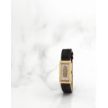 Longines. Montre bracelet en or jaune 14K (585) de forme rectangulaire mouvement m&#233;canique L...