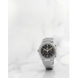 Heuer. Chronographe bracelet en acier avec date mouvement automatique Heuer. A stainless steel au...