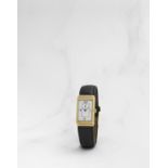 Yves Saint Laurent. Montre bracelet en or jaune 18K (750) rectangulaire r&#233;versible mouvement...