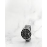 Omega. Montre bracelet en acier avec date mouvement automatique Omega. A stainless steel automati...