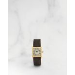 Cartier. Montre bracelet en or jaune 18K (750) de forme rectangulaire mouvement m&#233;canique Ca...