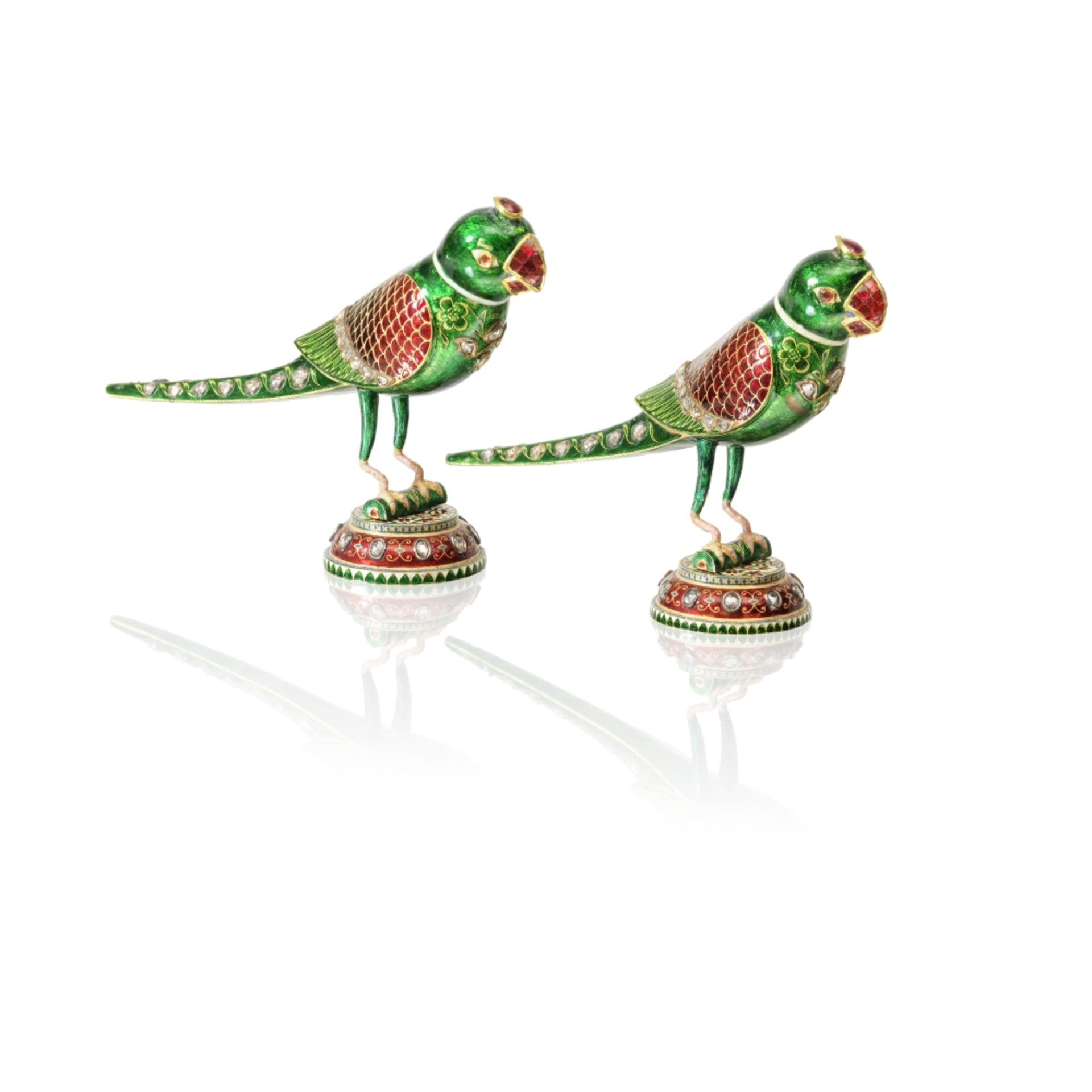 A pair of large gem-set enamelled-gold parrots Jaipur, North India, 19th/ 20th Century(2)