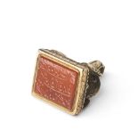 A gold-mounted Mughal Carnelian seal bearing the name John Osborne India, the seal dated AH 1192/...