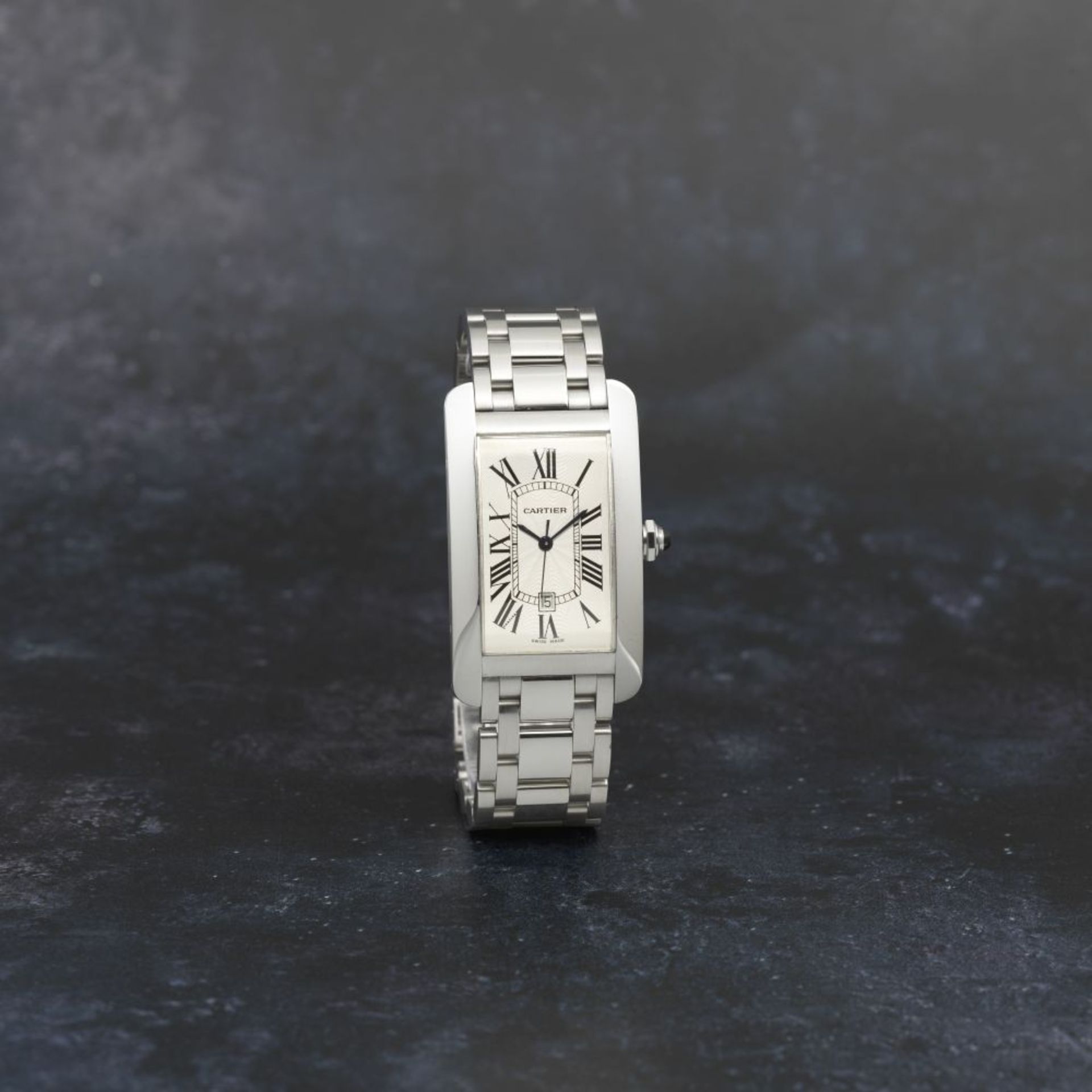 Cartier. A fine 18K white gold automatic calendar bracelet watch Tank Americaine, Ref: 2521, Cir...
