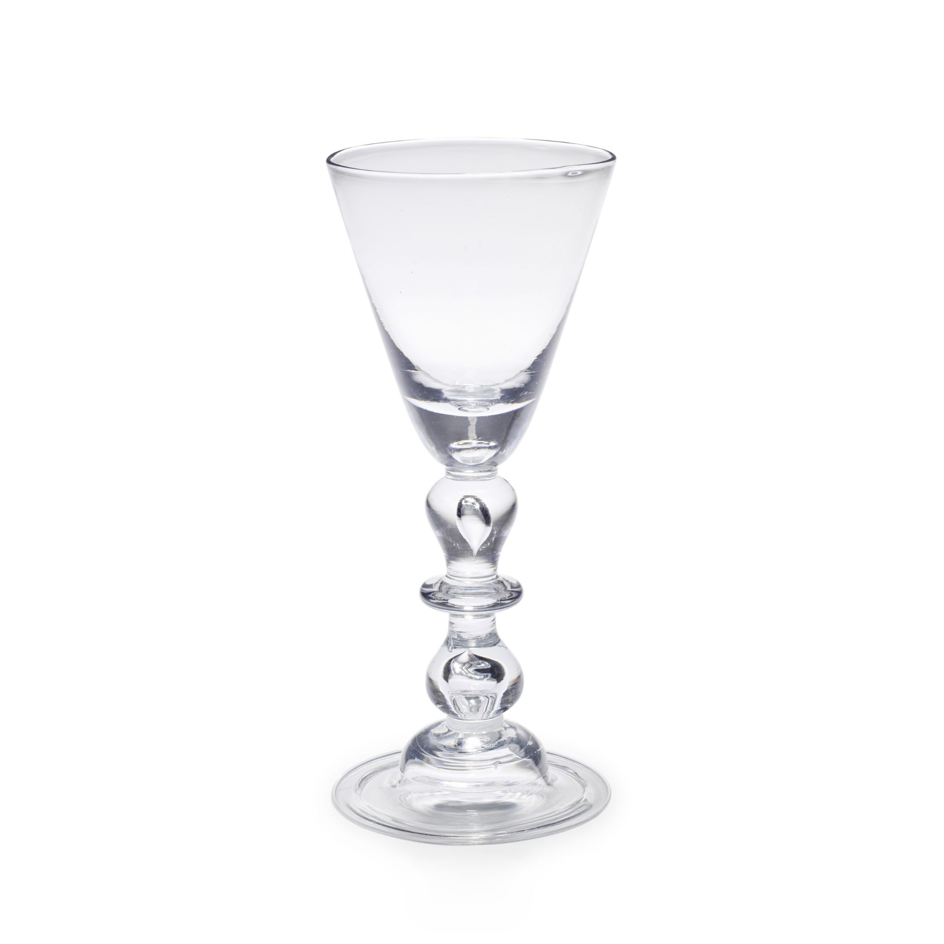 A fine baluster wine glass, circa 1725