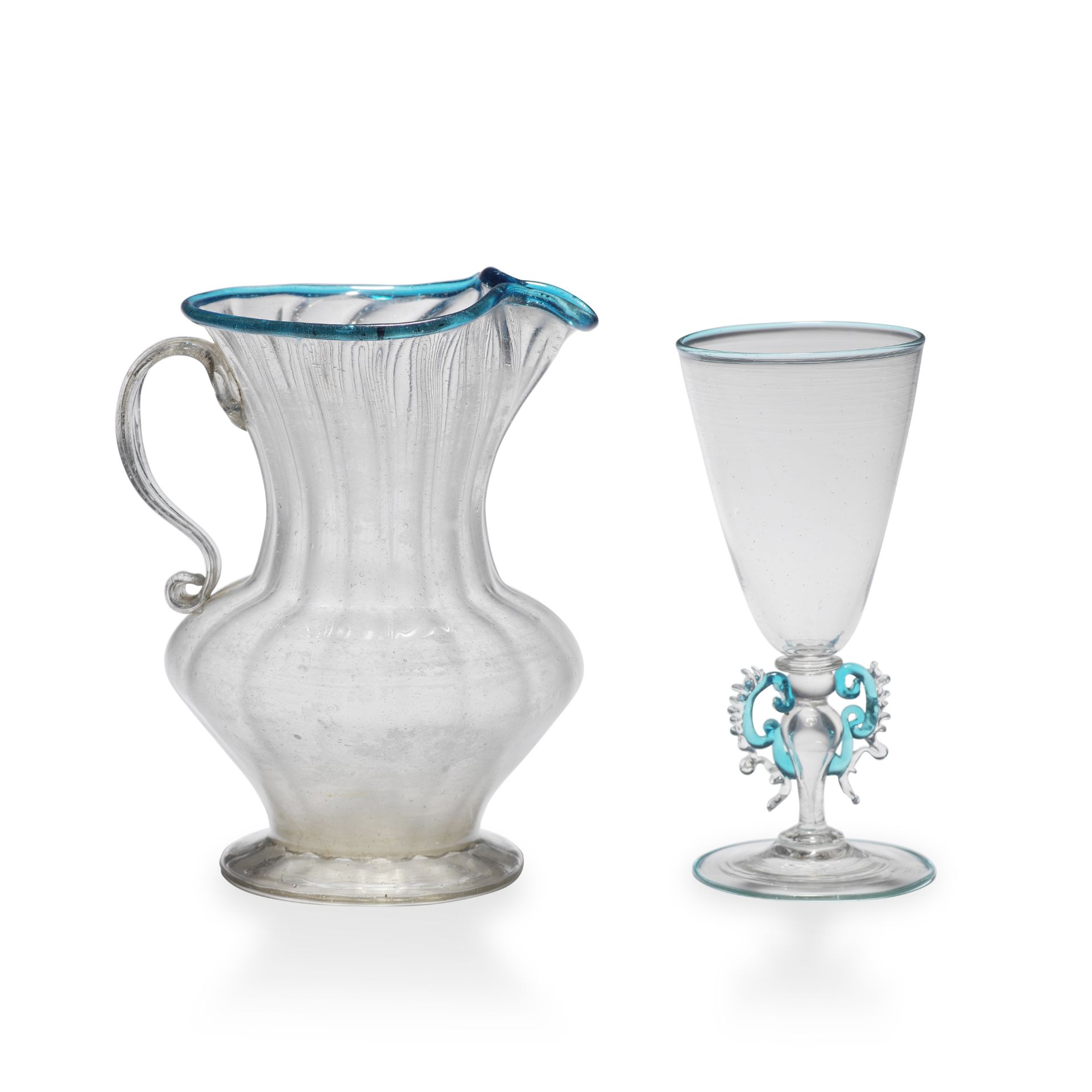 A fa&#231;on de Venise jug, 17th century, and a winged wine glass, late 19th century