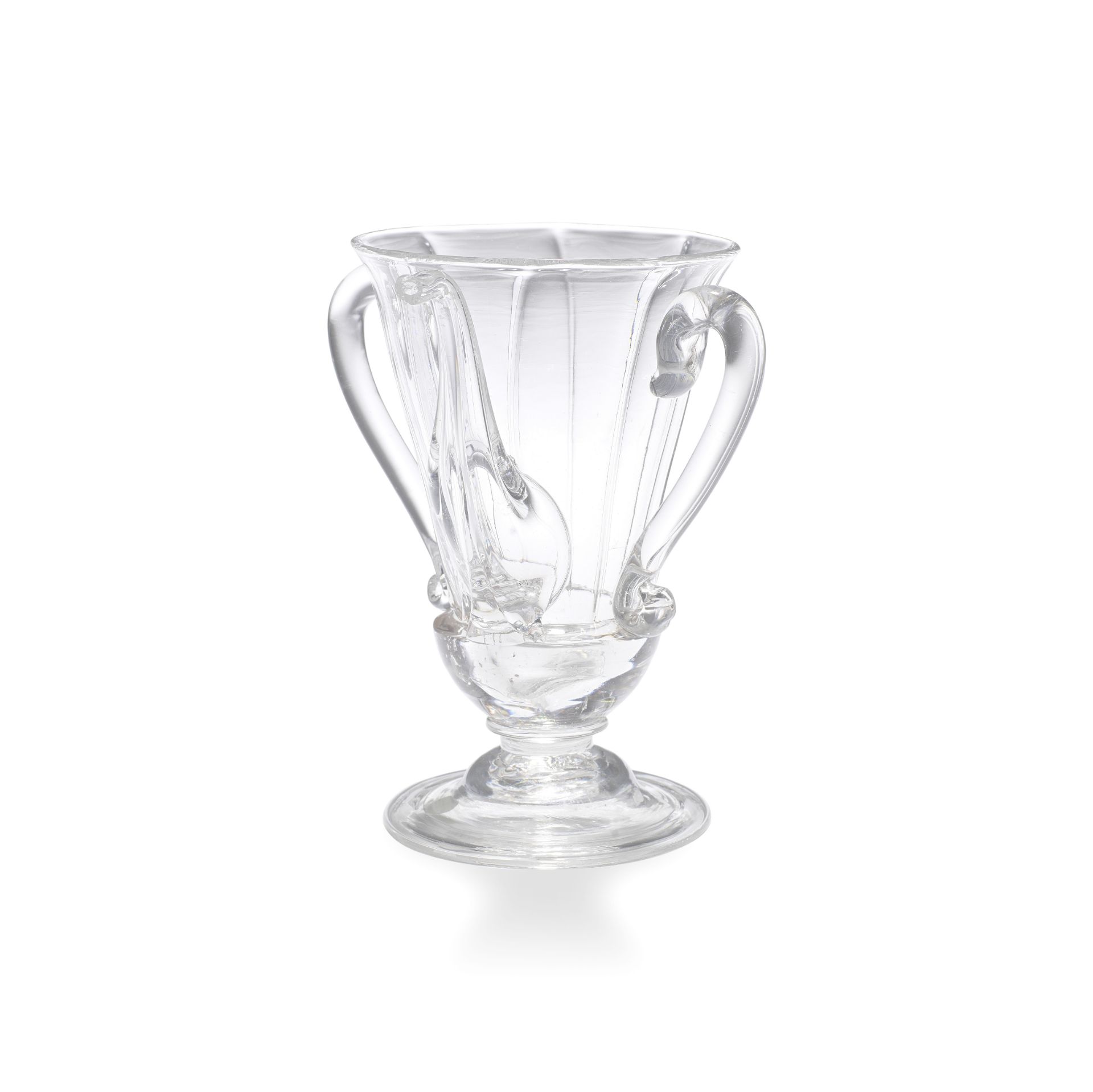 A rare moulded posset or syllabub glass, second quarter 18th century