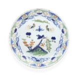 An English delftware plate, circa 1730