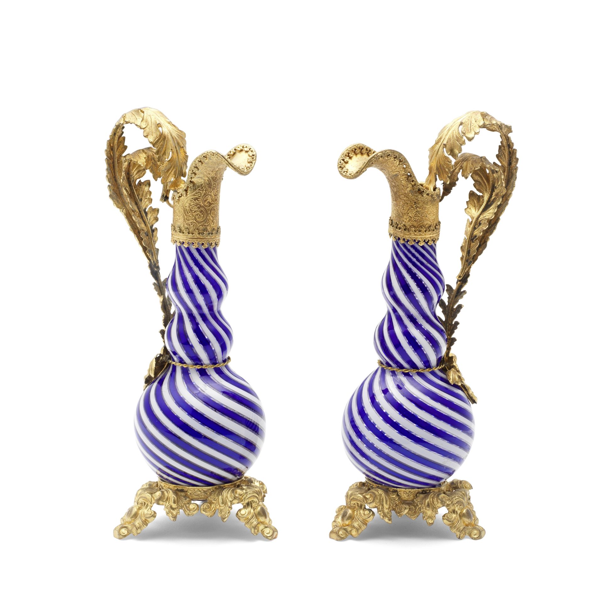A pair of French gilt metal mounted ewers, late 19th century