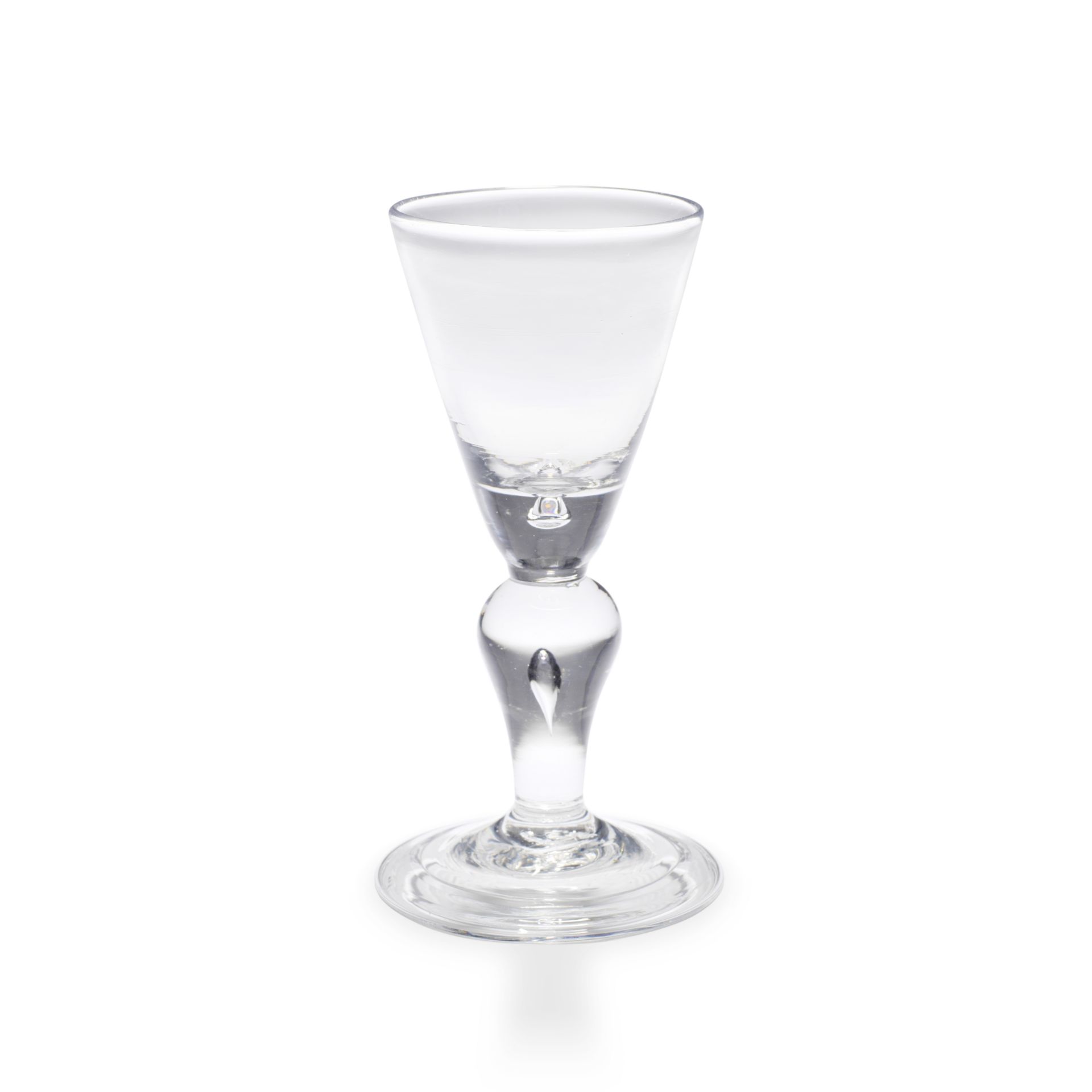 A fine heavy baluster wine glass, circa 1710