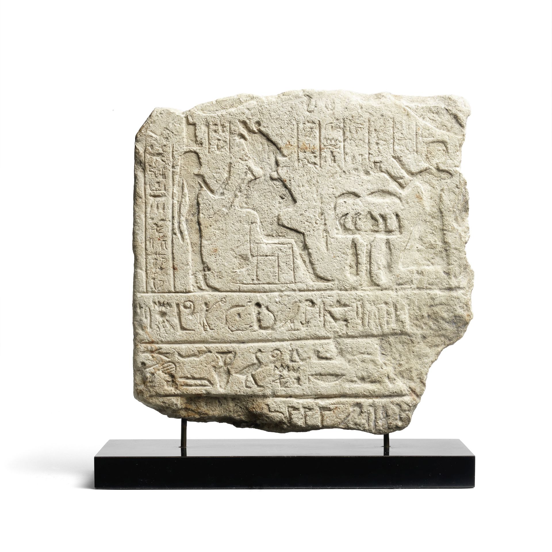 An Egyptian limestone fragmentary stele