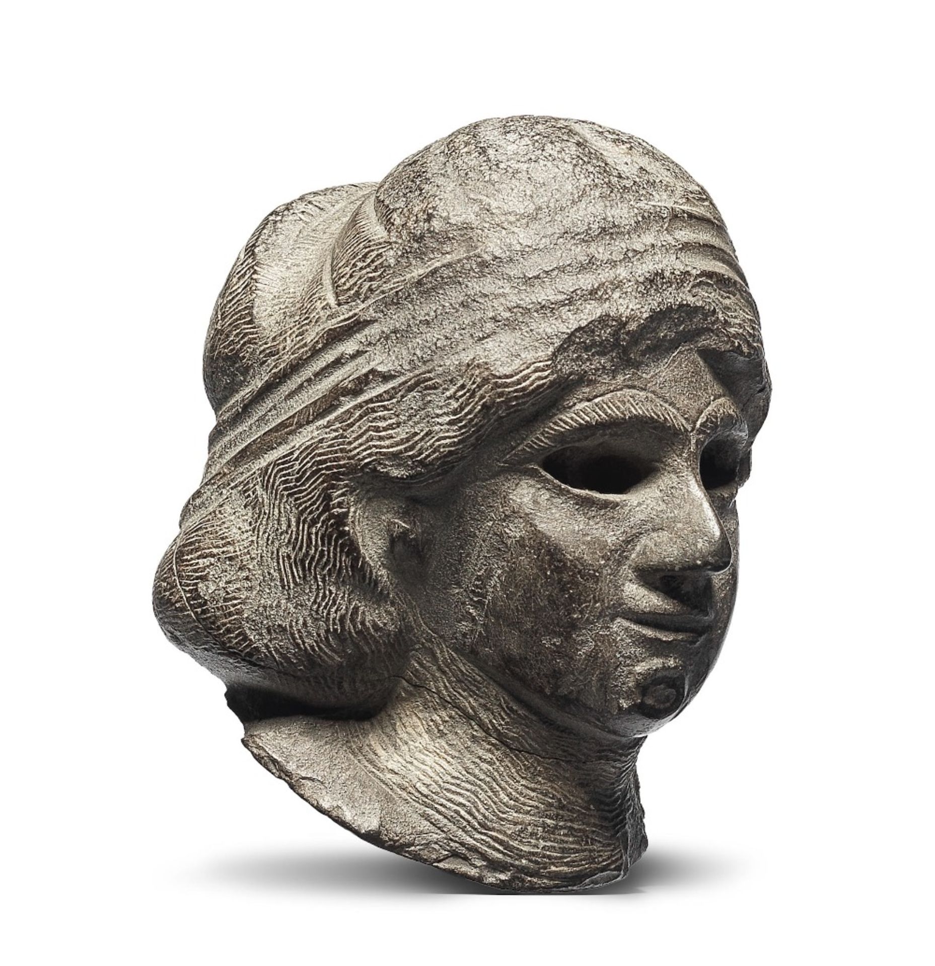 A Western Asiatic grey stone head of a female worshipper - Image 3 of 3