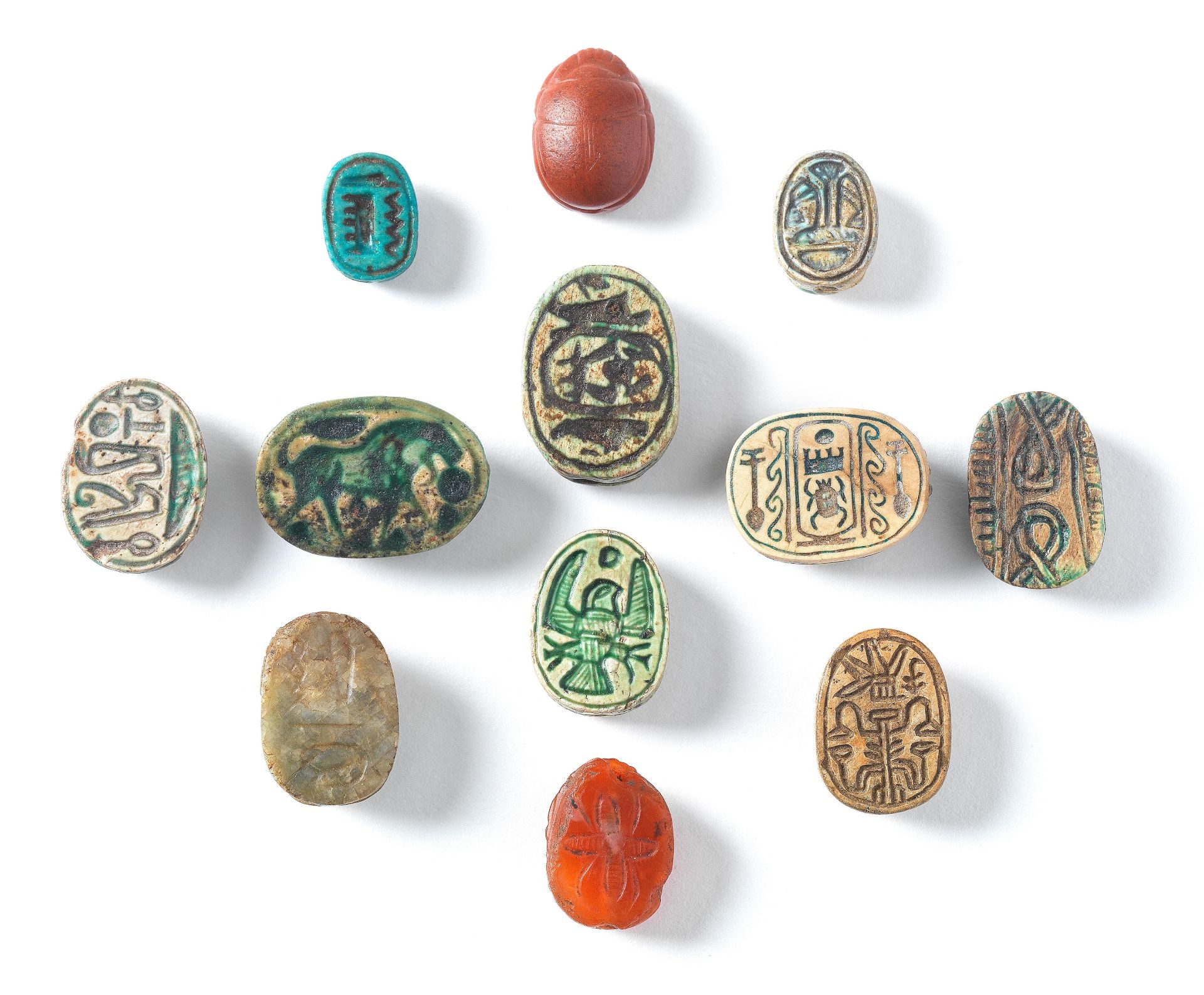 Twelve Egyptian scarabs and six later scarabs, 18