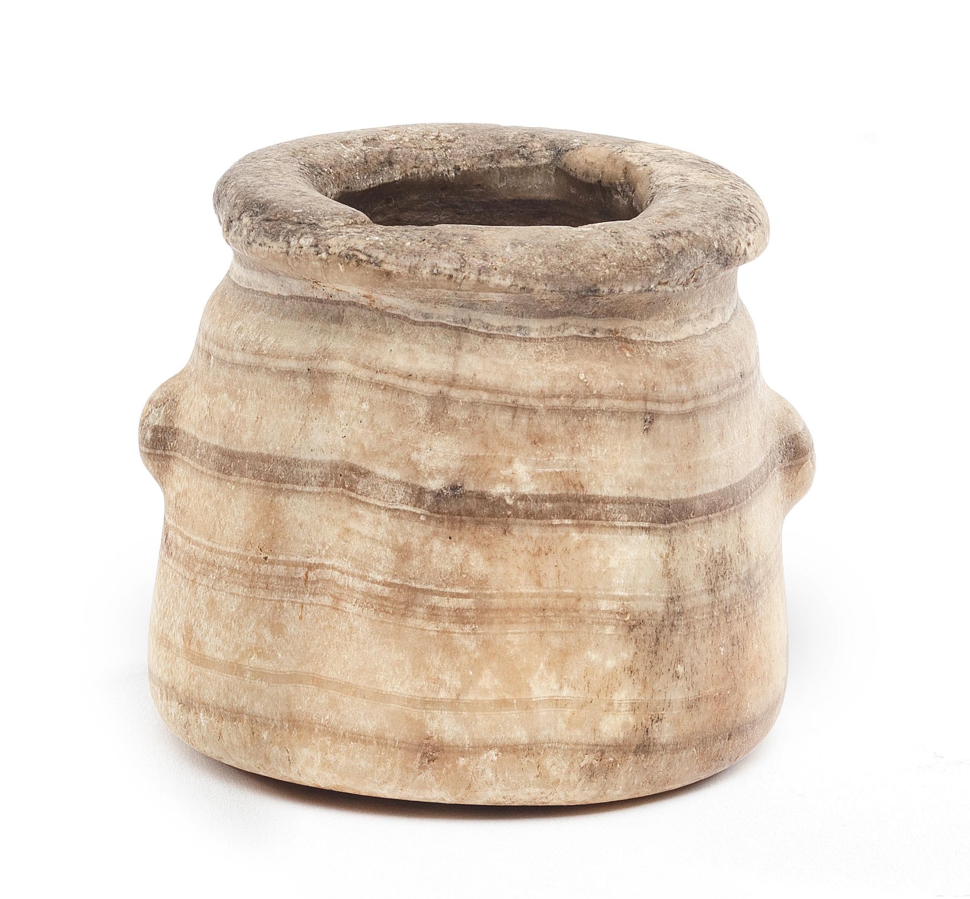 An Egyptian banded alabaster jar