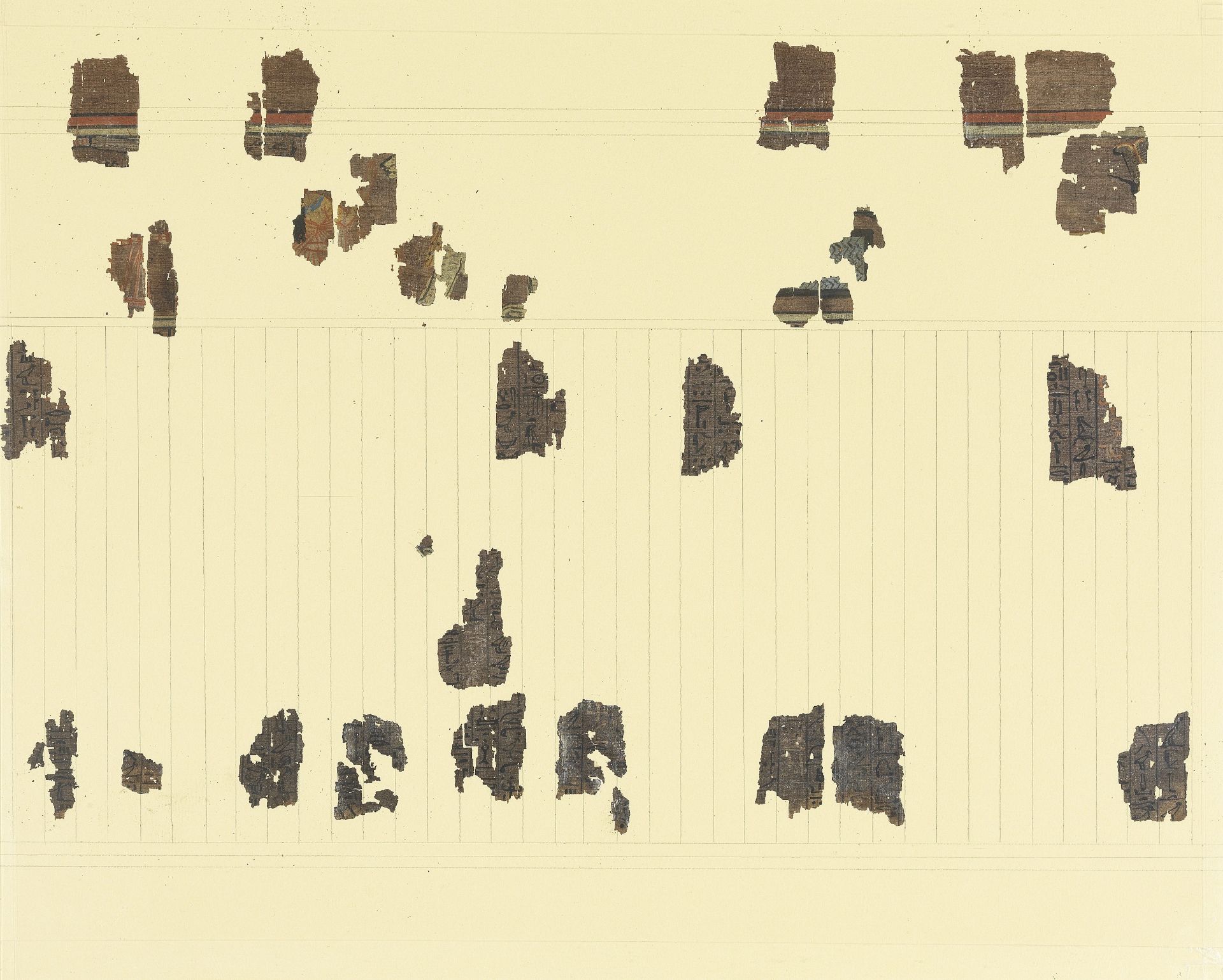 Fifteen frames containing fragments of ink inscribed papyri with remains of polychrome vignettes ...