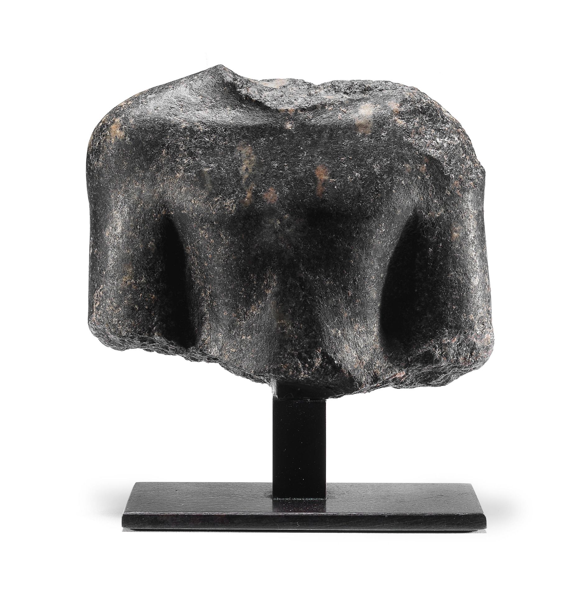 An Egyptian granite male torso