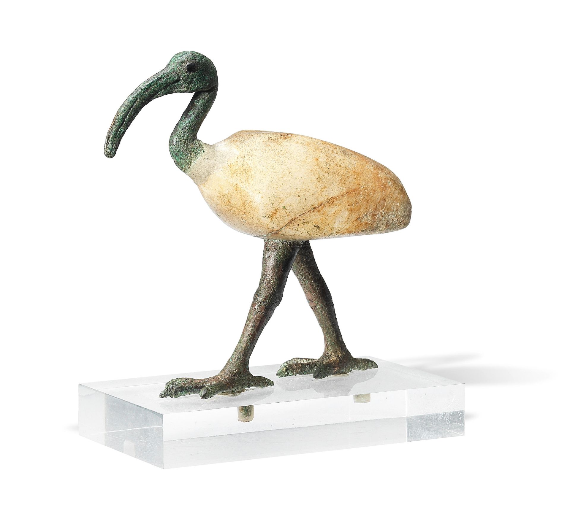 An Egyptian bronze and alabaster striding ibis