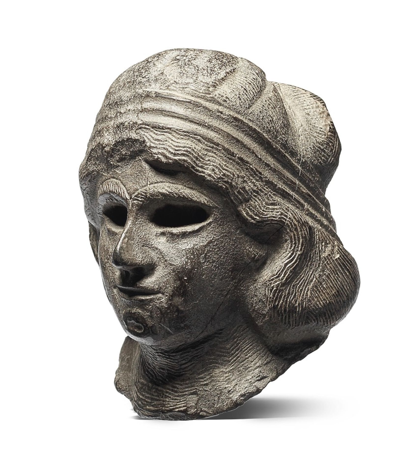 A Western Asiatic grey stone head of a female worshipper - Image 2 of 3