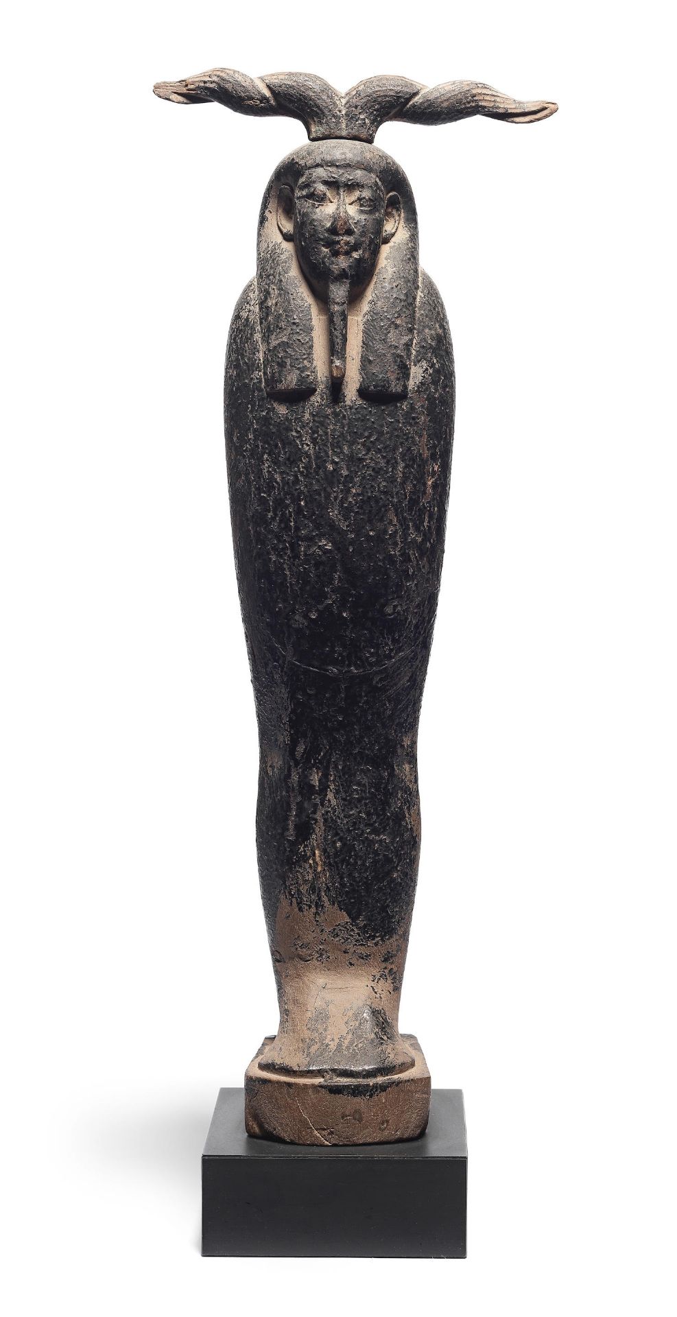 An Egyptian wood figure of Ptah-Sokar-Osiris