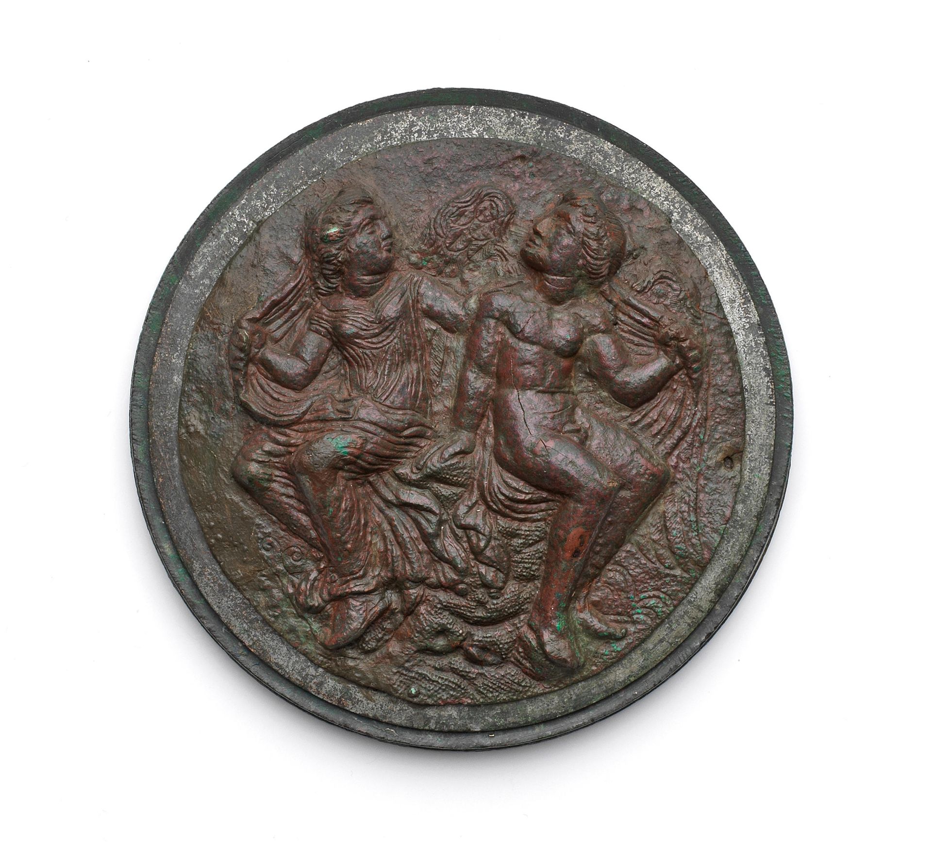 A Hellenistic bronze mirror cover